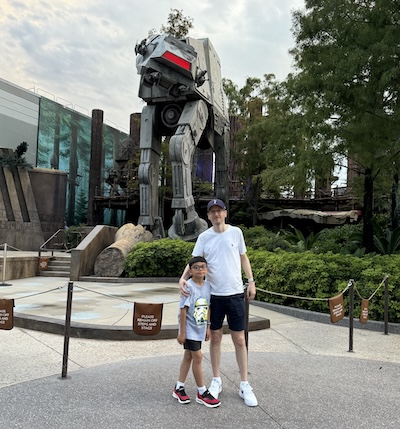 Ross and his son at Disney World